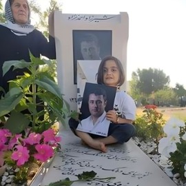 دختر شیرزاد احمدی‌نژاد بر سر مزار پدرش