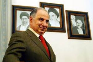 عکسی از احمد چلبی در زیر تصویر سران رژیم ایران