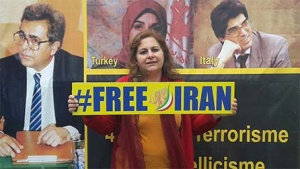 یک زن ایرانی در تظاهرات بروکسل خواهان تغییر است